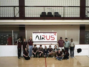 The AIRUS team poses for a picture taken by the camera UAS. Can you spot the pilot?